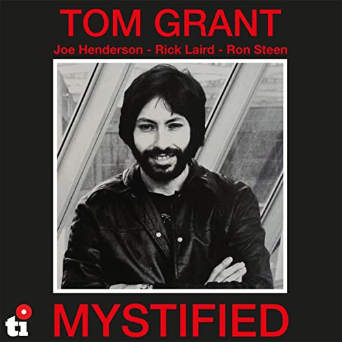 Black and white portrait of Tom Grant on album cover, "Mystified".