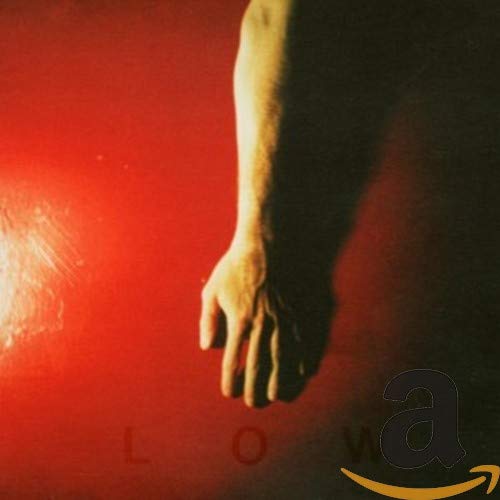 Red album cover with a hand and the word "LOW" in large letters.