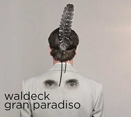 CD cover: man with feather in hair, eyes on back.