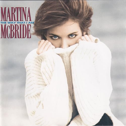 Martina McBride album cover: woman in a white cable-knit sweater.