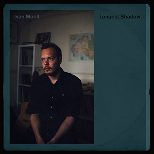 CD cover featuring a portrait of a man in a room.
