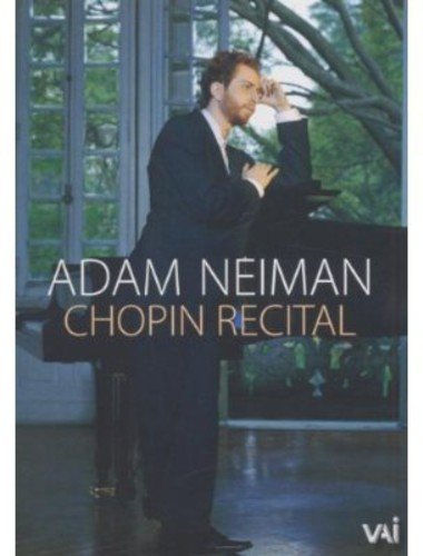 DVD cover featuring pianist Adam Neiman in a suit at a piano.