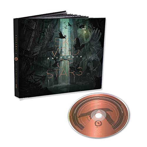 Katatonia “Sky Void Of Stars” CD with dark forest imagery and a gold disc.