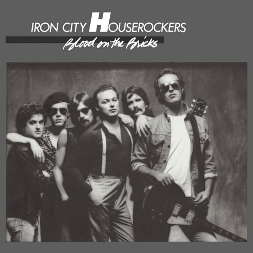 Black and white photo of the Iron City Houserockers band.