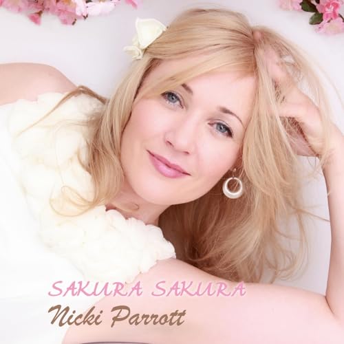 Blonde woman with pearl earrings, album cover "Sakura Sakura" by Nicki Parrott.