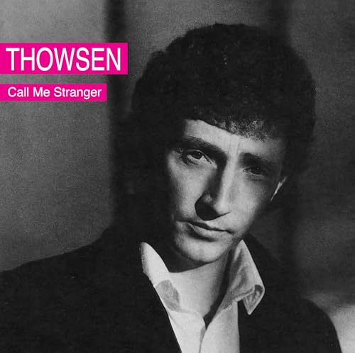 Black and white portrait of a man with curly hair, album cover.