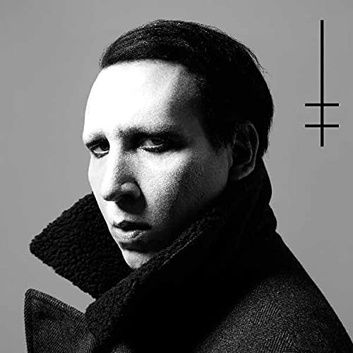 Black and white portrait of Marilyn Manson with a cross symbol.