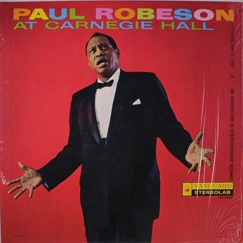 Paul Robeson portrait on red album cover, wearing a tuxedo.