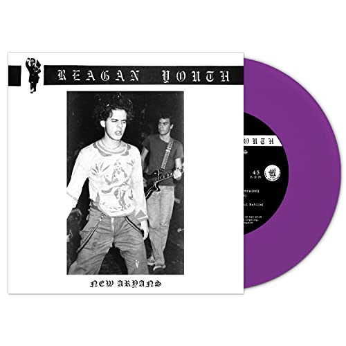 Purple vinyl record with black and white album cover featuring a band.