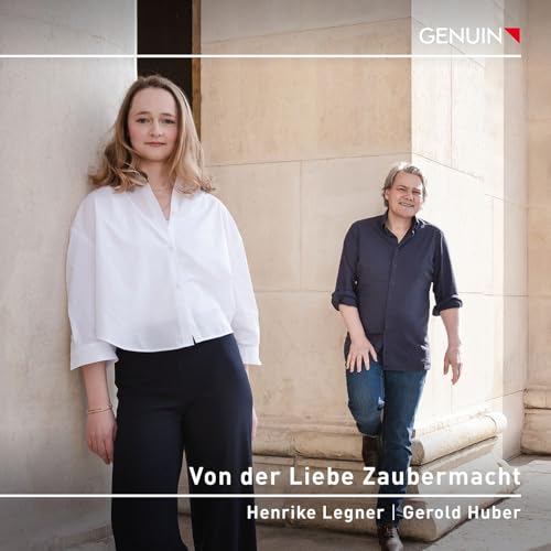 CD cover featuring a woman and man standing near a stone building.