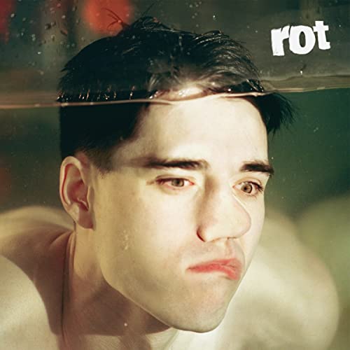 CD cover for Tennyson’s “Rot” featuring a man partially submerged in water.