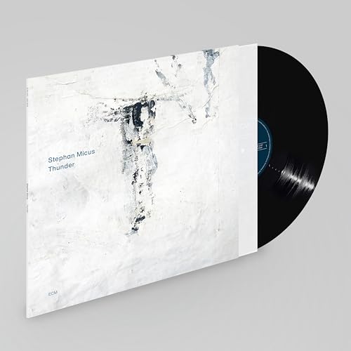 Vinyl record and album cover for Stephan Micus’ “Thunder,” abstract art.