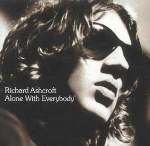Black and white close-up portrait of Richard Ashcroft wearing sunglasses on album cover.