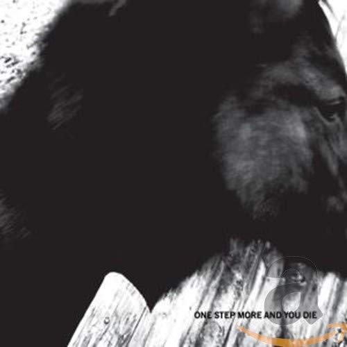 Black and white CD cover with a blurred, shadowed face and text.