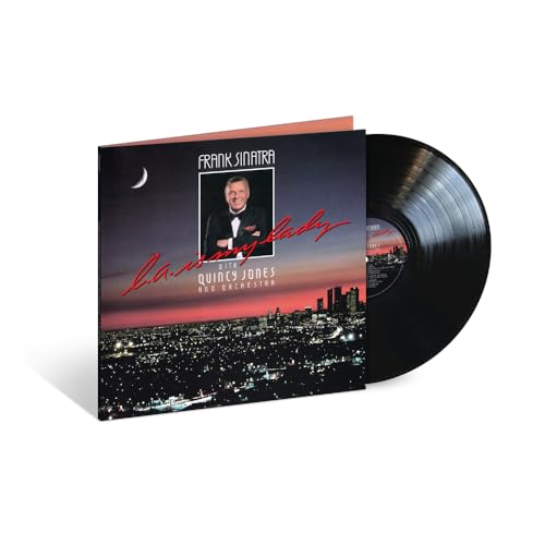Frank Sinatra’s “L.A. Is My Lady” vinyl record with city skyline cover.