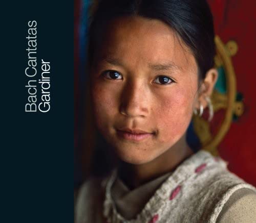 CD cover featuring a close-up portrait of a young person with dark hair.