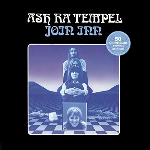 Ash Ra Tempel album cover: people in a surreal, blue-toned landscape.
