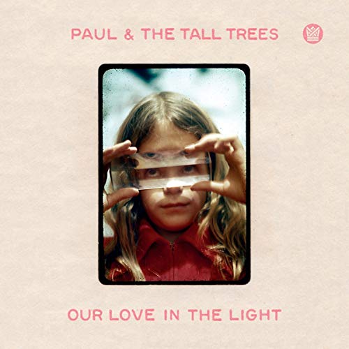 Album cover showing a child looking through a glass prism against a beige background.