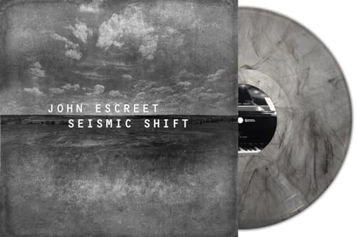 Album cover for John Escreet’s “Seismic Shift” with grey marbled vinyl record.
