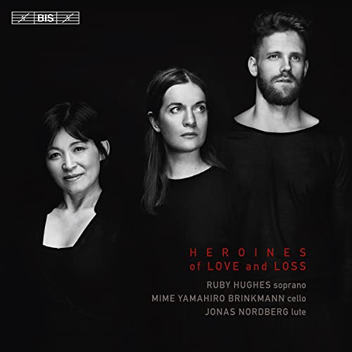 CD cover: three musicians in black clothing, with album title.