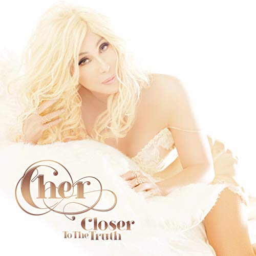 Cher album cover, blonde hair, white fur, and album title text.
