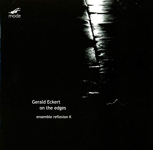 CD cover: dark, abstract image of a path with bright center light.