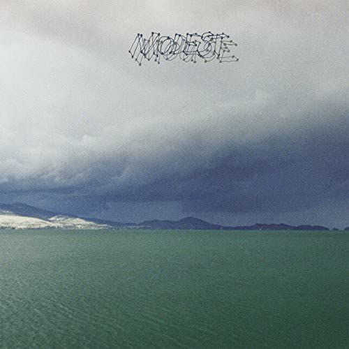 Album cover: landscape with water, mountains, and the band’s name in script.