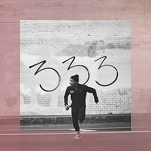 CD cover: person running before graffiti of large numbers "333".