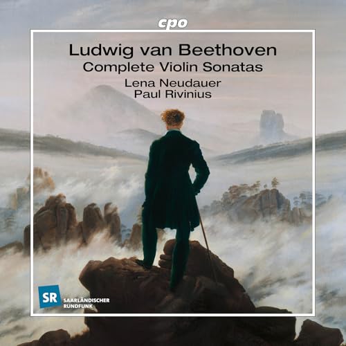 CD cover: man in green coat overlooking a misty, rocky landscape.