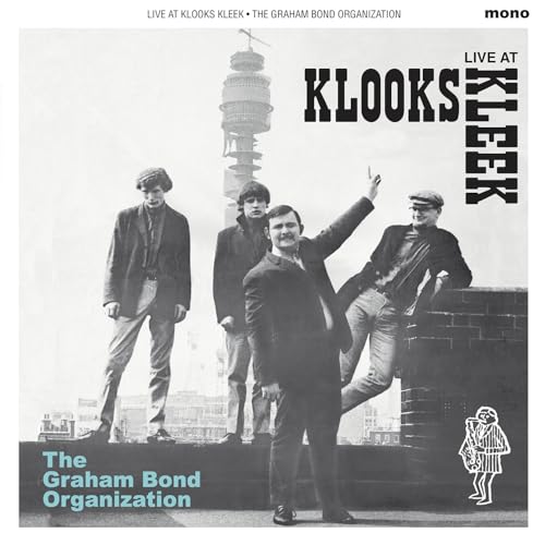 Black and white album cover featuring four men and the Post Office Tower.