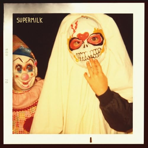 Supermilk album cover featuring figures in ghost and clown masks.