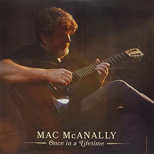 Mac McAnally portrait playing acoustic guitar, album cover “Once in a Lifetime”.