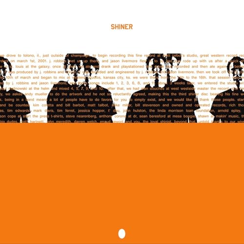 Orange vinyl record cover for Shiner’s “Egg The” with silhouetted figures.
