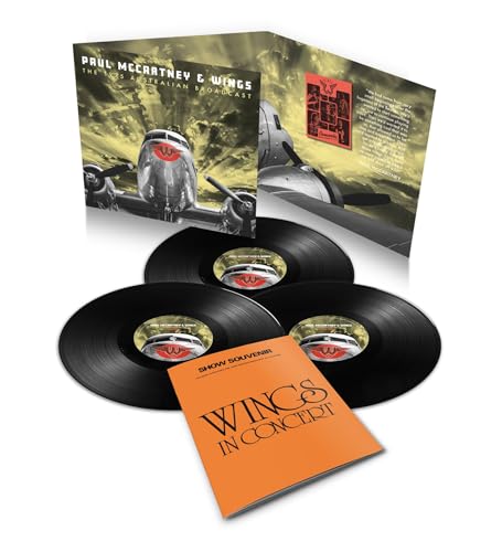 Three vinyl records and a booklet featuring an airplane image.