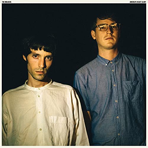 CD cover featuring two men with direct gazes against a dark background.