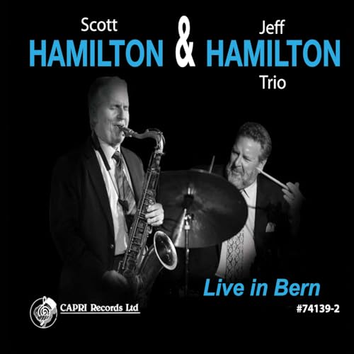 Black and white photo of Scott and Jeff Hamilton playing instruments.
