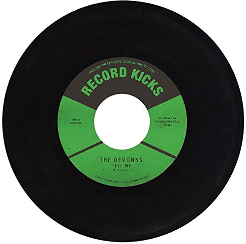 Black 7-inch vinyl record with a green and yellow center label.