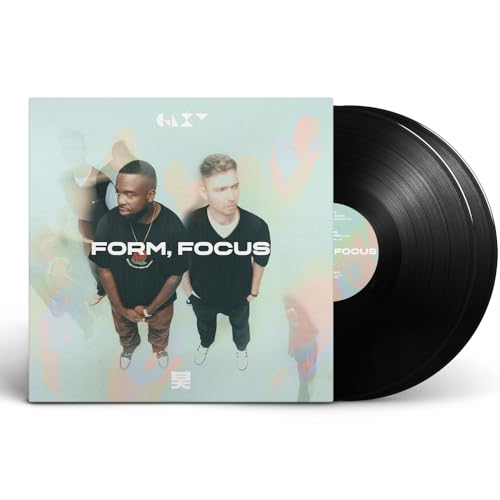 Vinyl record and album cover featuring two men, text “Form, Focus”.