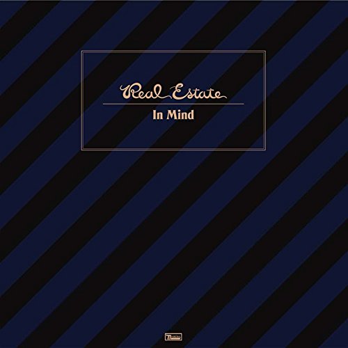 Real Estate’s “In Mind” album cover: dark blue stripes, gold text.