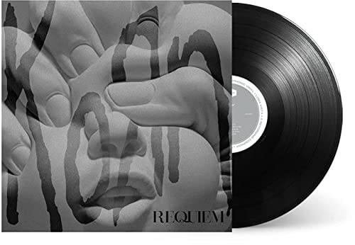 Korn Requiem vinyl record with cover art showing hands covering a face.