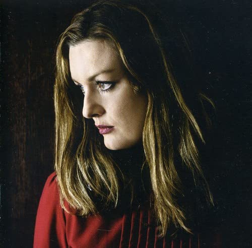 CD cover featuring a woman with long brown hair in profile.