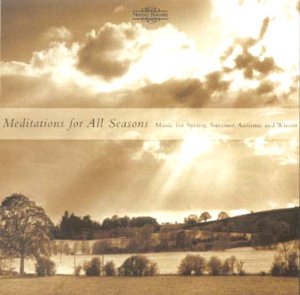 CD cover with a landscape of fields, water, and cloudy sky.