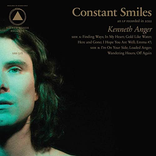 Vinyl album cover for "Constant Smiles" by Kenneth Anger, featuring a portrait.