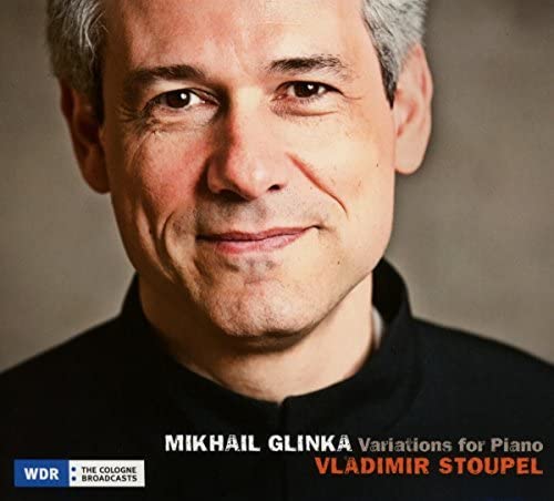 CD cover featuring a close-up portrait of pianist Vladimir Stoupel.
