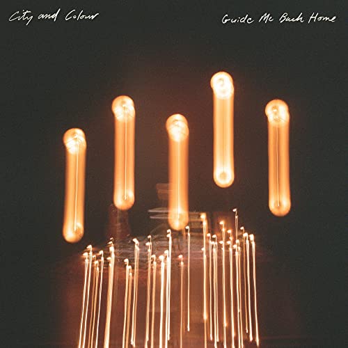 CD cover: dark background with blurred, glowing lightbulb image.