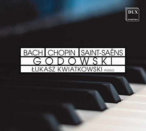CD cover with piano keys and composers’ names: Bach, Chopin, Saint-Saëns.