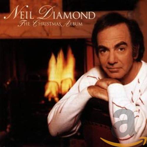 Neil Diamond album cover featuring the artist by a fireplace.