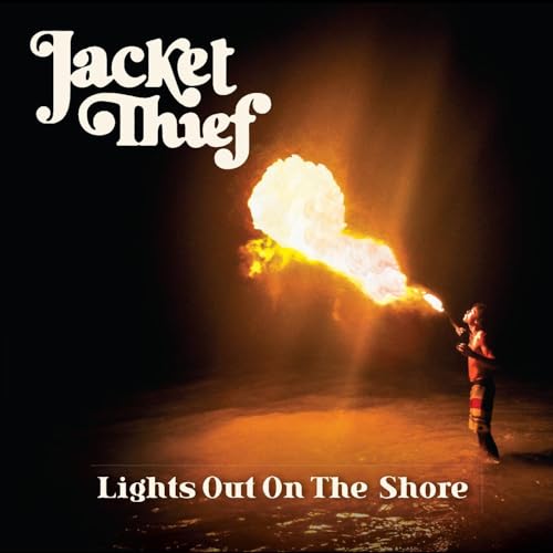 Album cover: fire breather on a dark beach, band name "Jacket Thief".