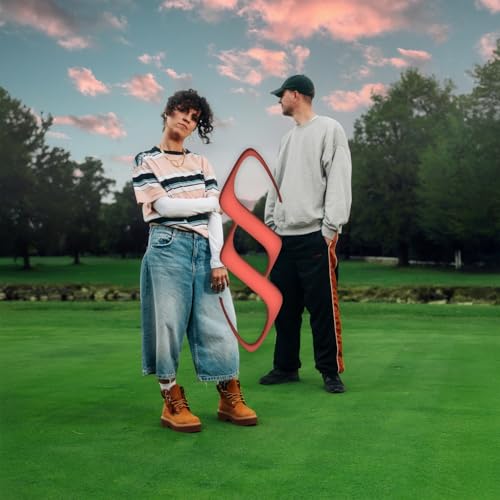 Two people standing on grass holding a red §imone vinyl record.
