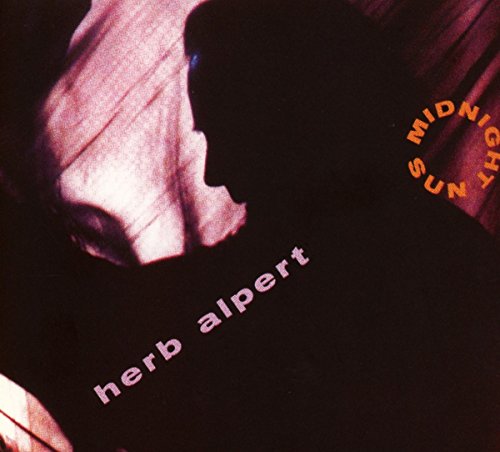 Herb Alpert's "Midnight Sun" CD cover with a shadowed profile and text.